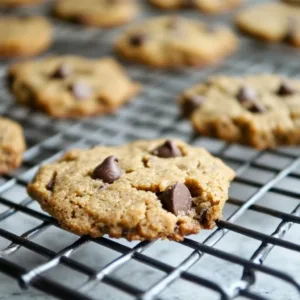 Irresistible Vegan Chickpea Flour Cookies: A Family‑Friendly Treat vegan chickpea flour cookies Fresh vegan chickpea flour cookie cooling on wire rack with chocolate chips