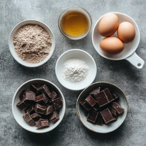 Tigernut Flour Brownies: Fudgy, Gluten-Free, and Family-Approved Tigernut Flour Brownies Ingredients for Tigernut Flour Brownies including tigernut flour, cocoa powder, eggs, coconut oil, and dark chocolate chunks.
